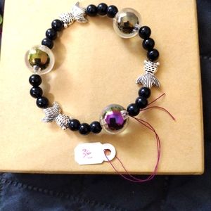 Artemis's Gems custom-made beaded bracelet with metal fish and bubble beads
